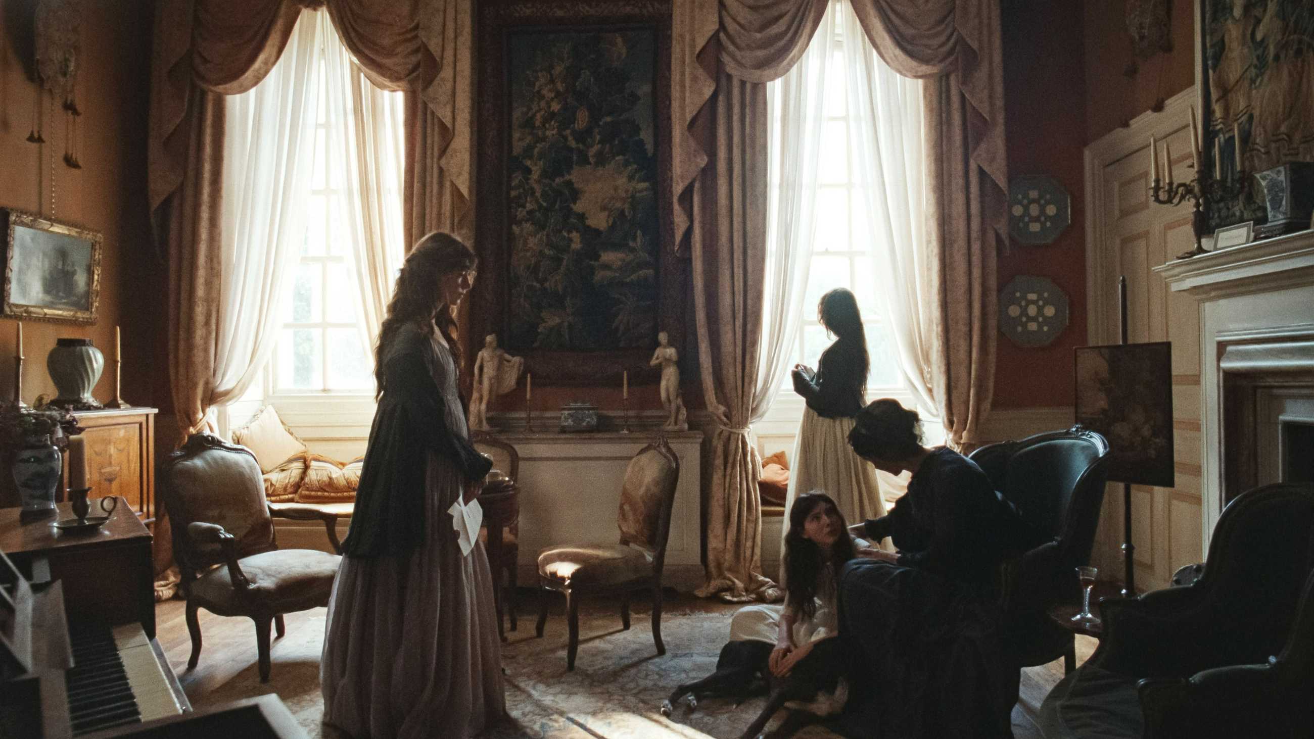 The Dashwood family together in the living room in Sense and Sensibility