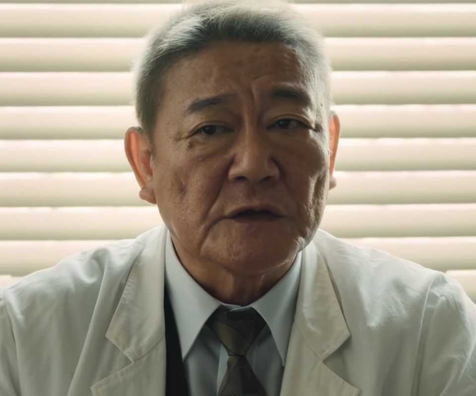 The doctor is sharing something in Godzilla Minus Zero