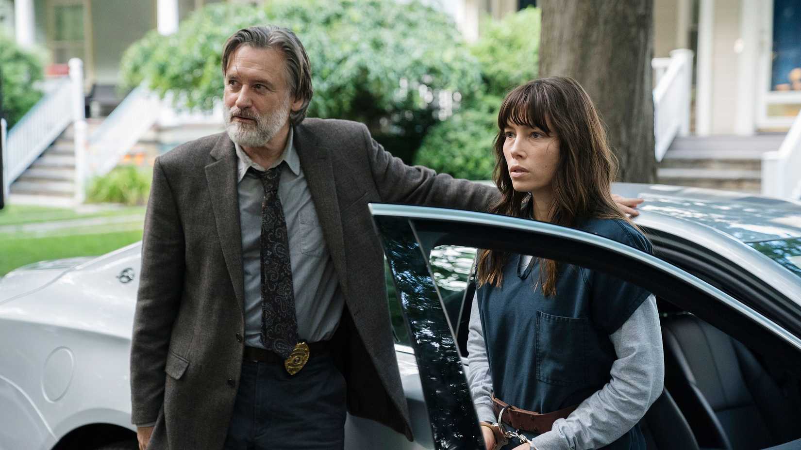 Harry (Bill Pullman) helping Cora (Jessica Biel) out of a car in The Sinner.