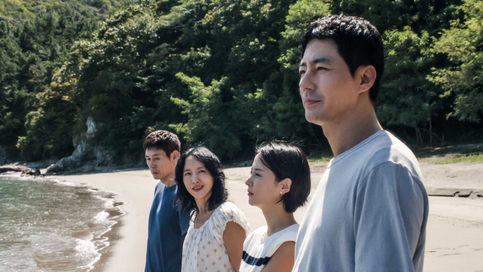 The two couples standing in a line at the beach in Possible Love