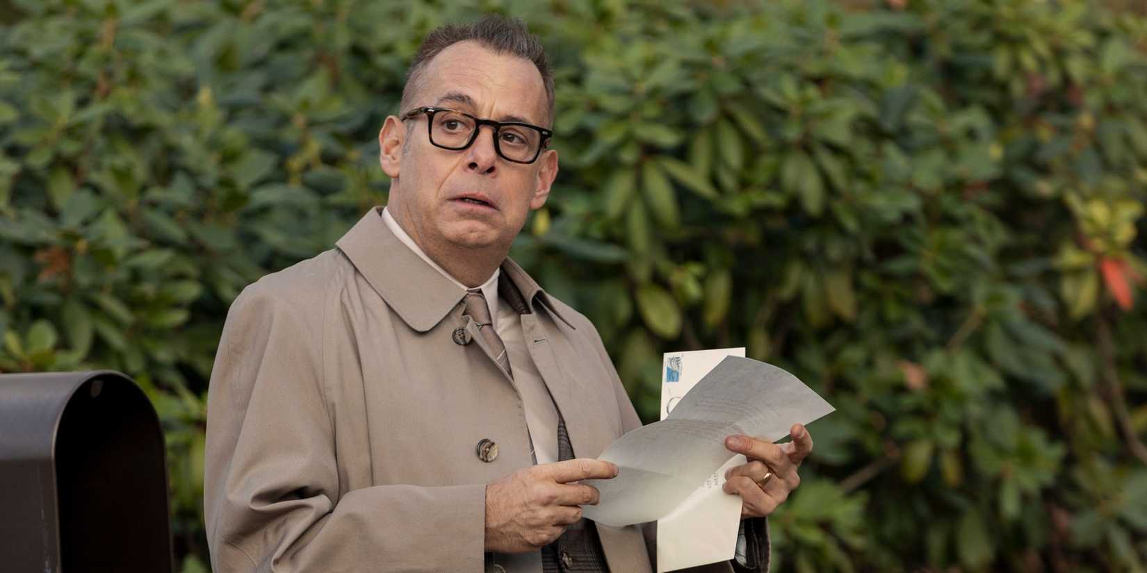John Graff (Joe Mantello) reading some mail in The Watcher.