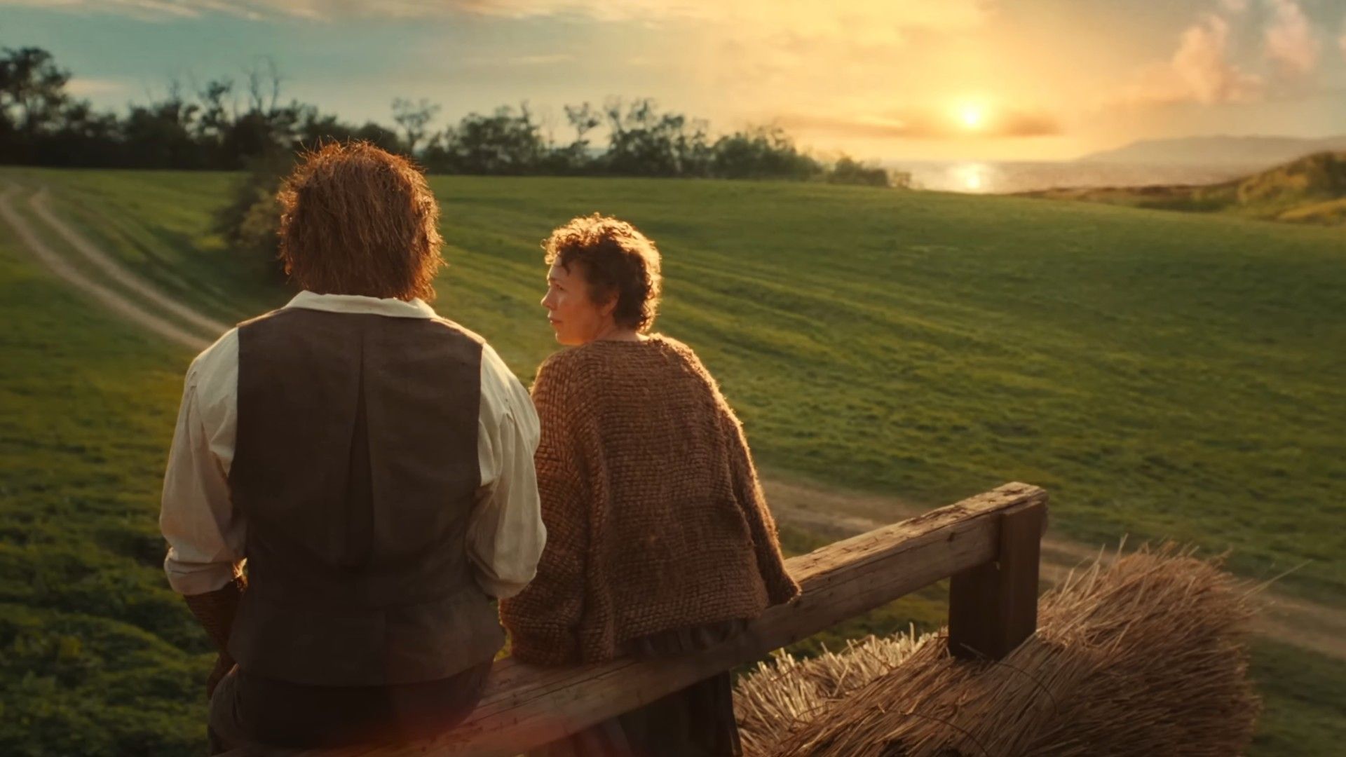 The wicker man and Olivia Colman sitting and watching the sunset in Wicker