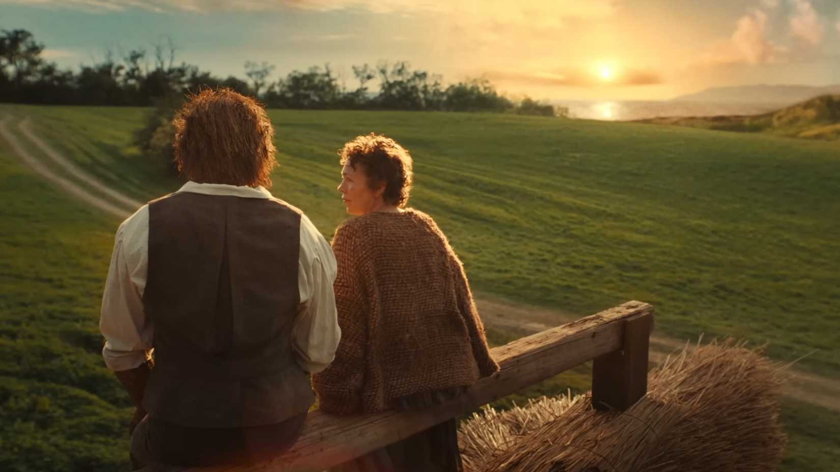 The wicker man and Olivia Colman sitting and watching the sunset in Wicker