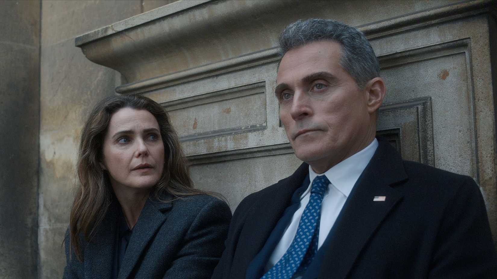 Kate and Hal sitting together in the Diplomat