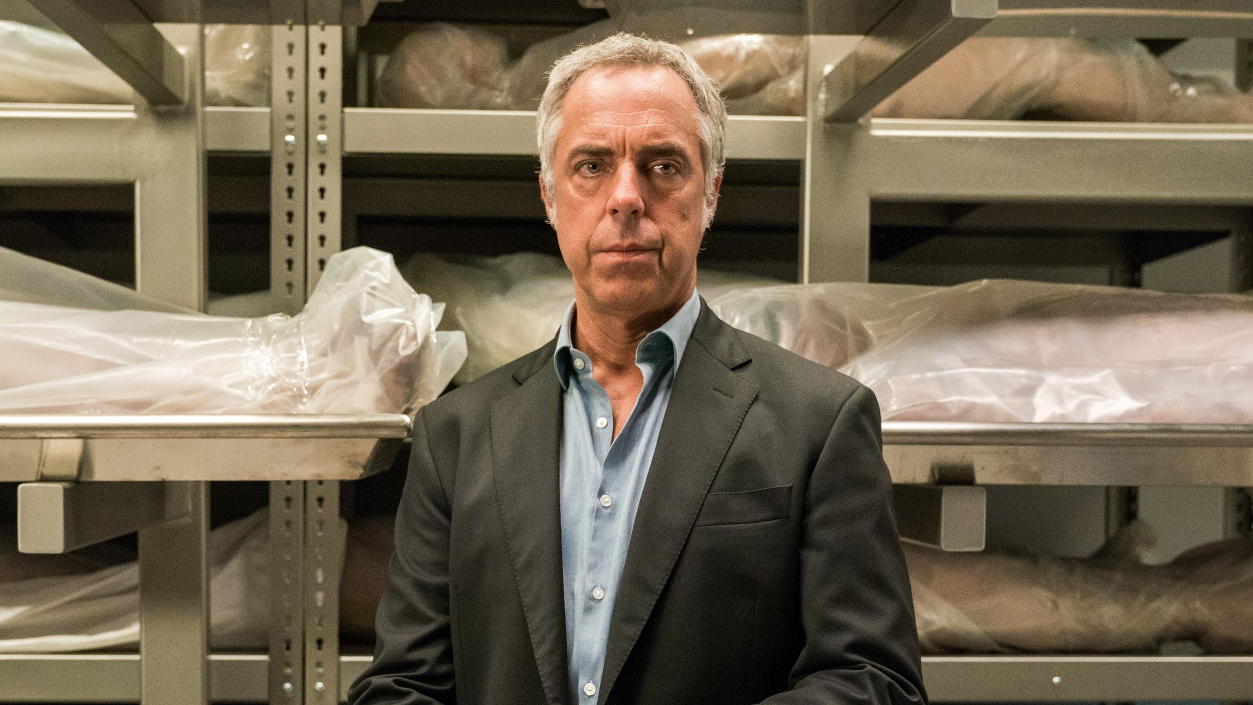 Titus Welliver's Bosch stands in a morgue in Bosch