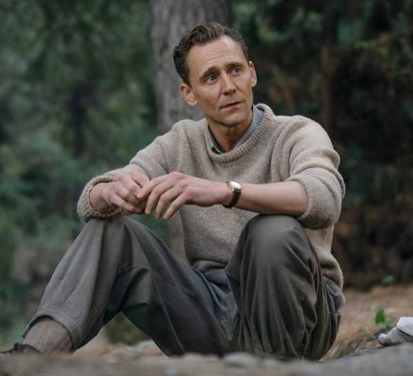 Tom Hiddleston sitting in Tenzing