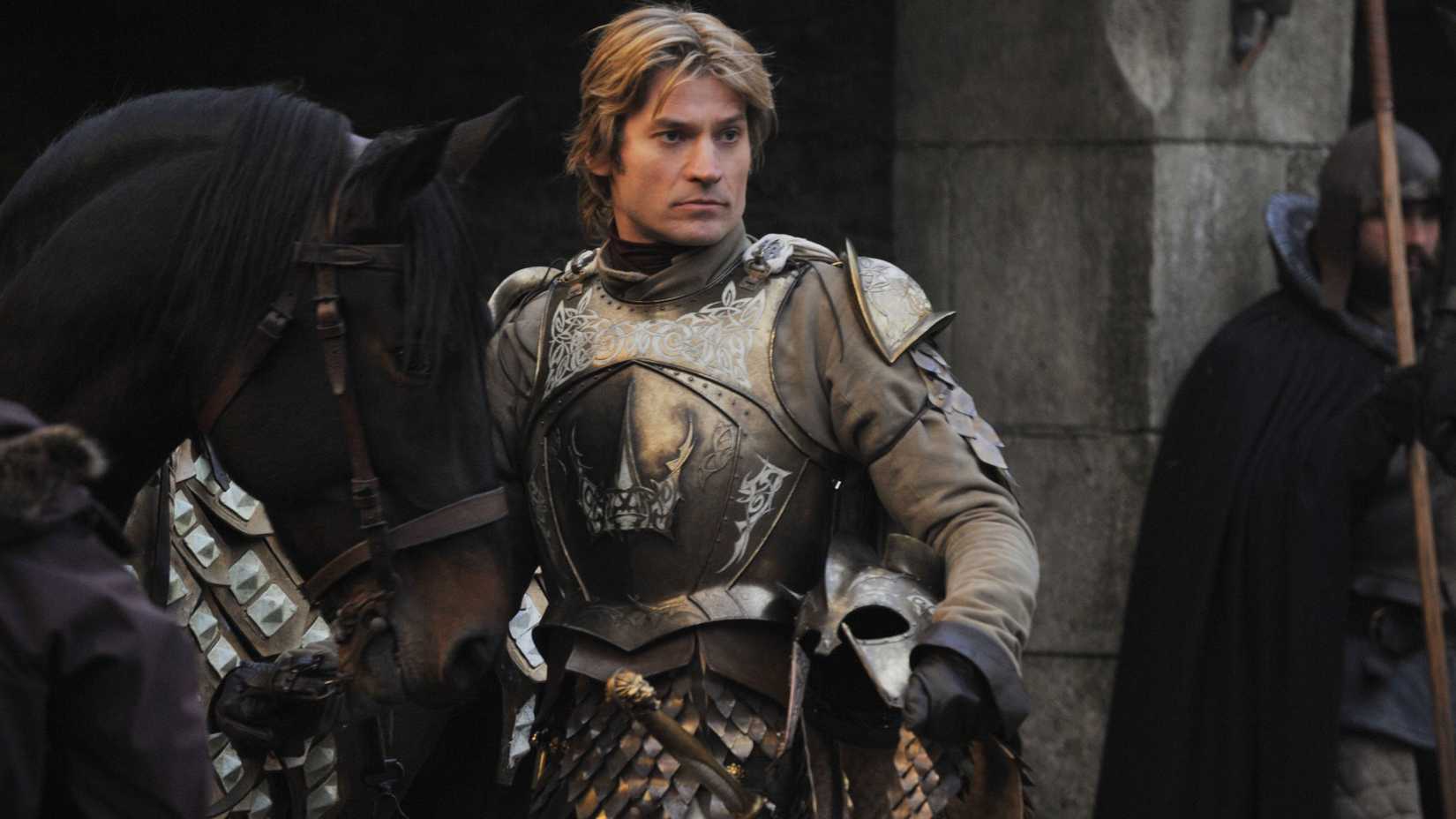 Jaime Lannister wearing gold armor in Game of Thrones season 1