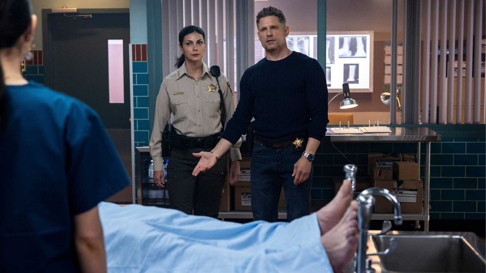 Morena Baccarin as Sheriff Mickey Fox and Matt Lauria as Boone on Sheriff Country