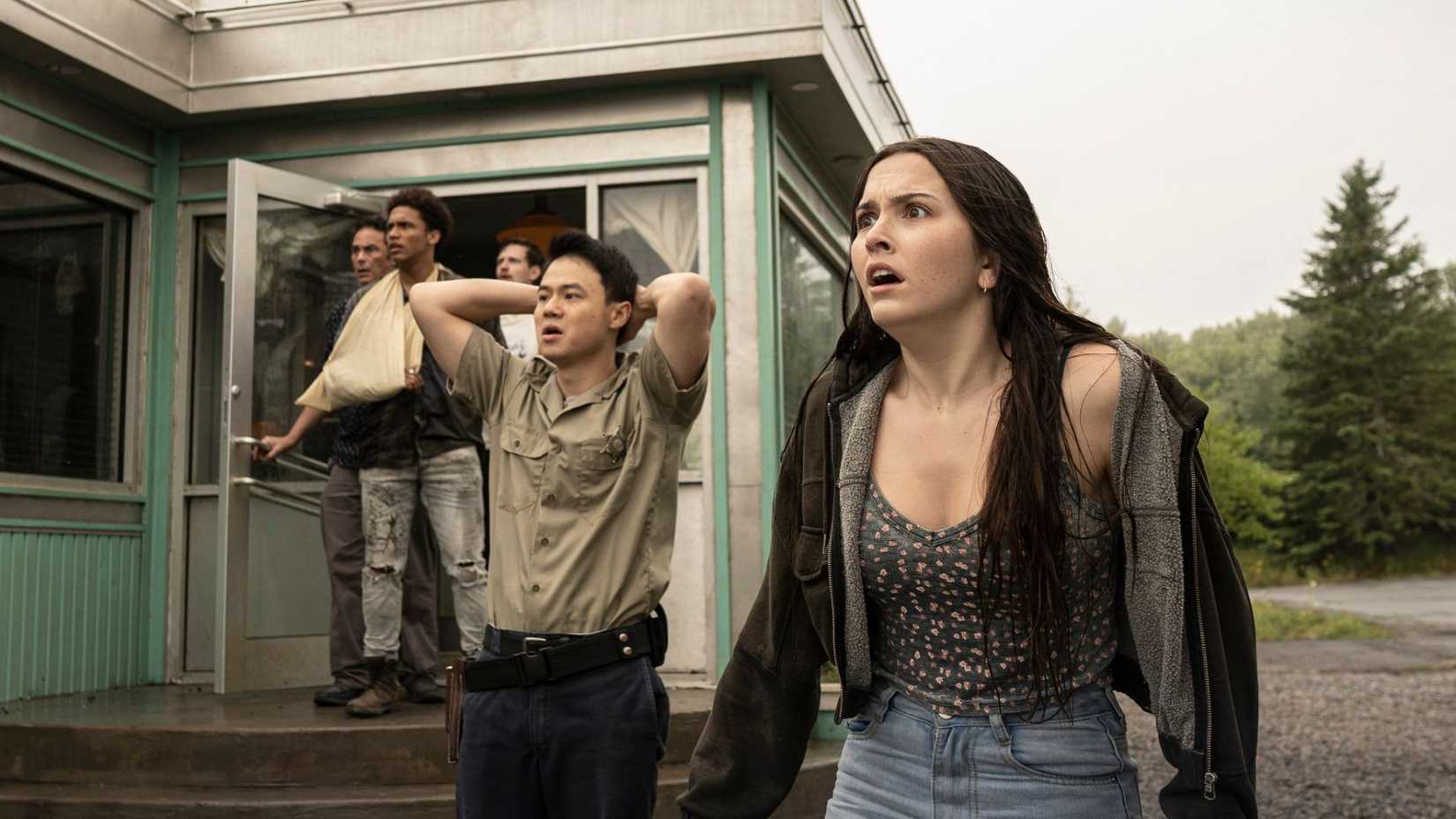 Characters in From standing outside and looking horrified at something off-camera