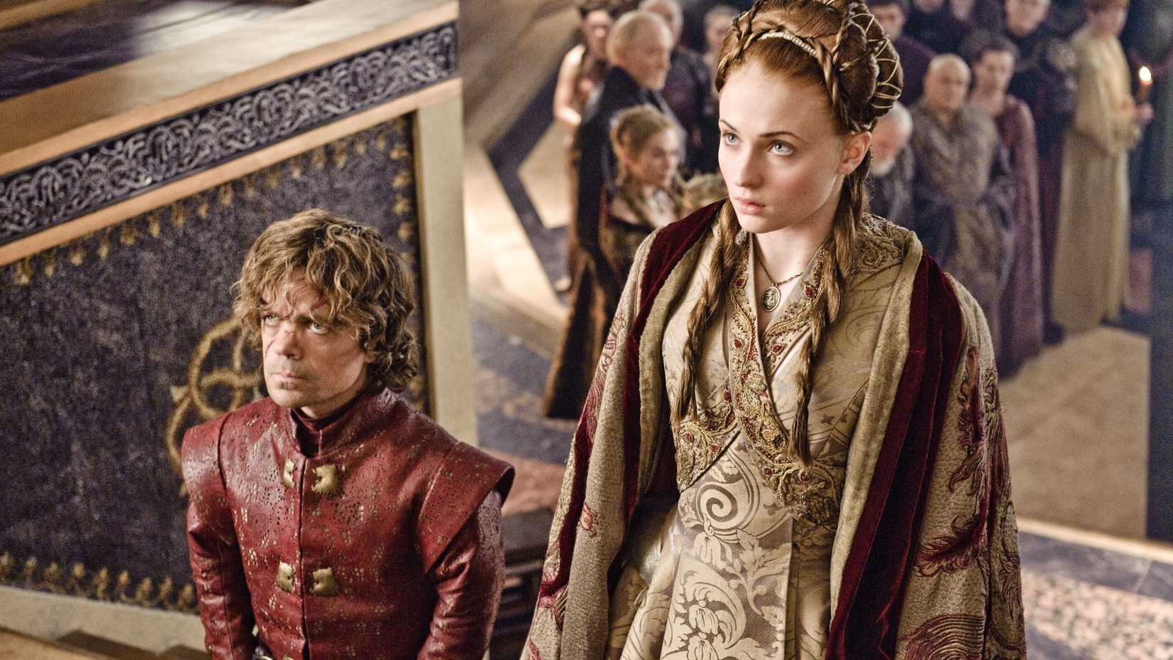 Sansa Stark and Tyrion Lannister, looking reluctant at their wedding