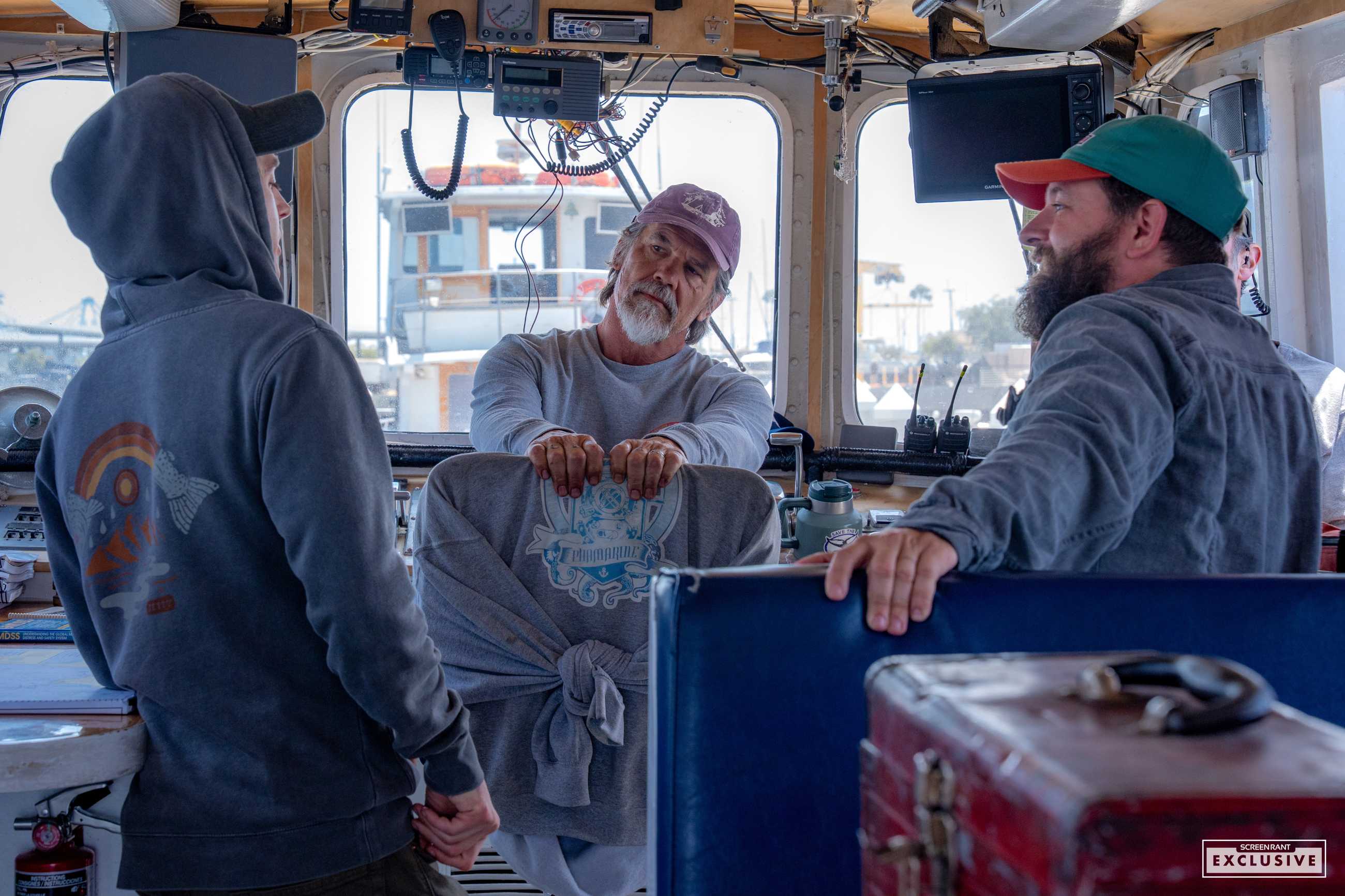 Austin Abrams, Josh Brolin, and Brian Duffield talking on the Whalefall set