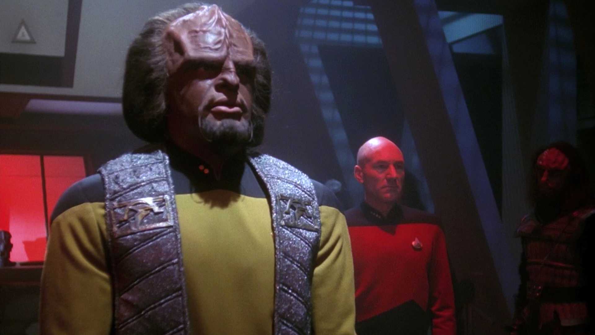 Worf with Picard behind him