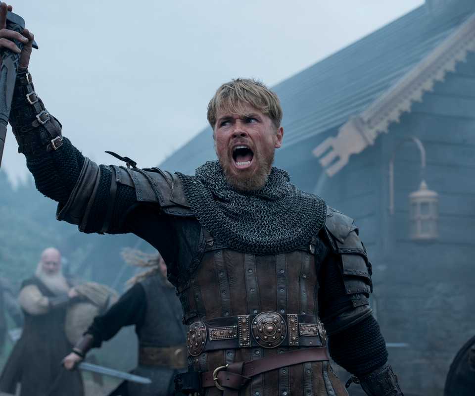 Xavier Molyneux (Erik Bloodaxe) screaming with axe raised in BLOODAXE SEASON 1