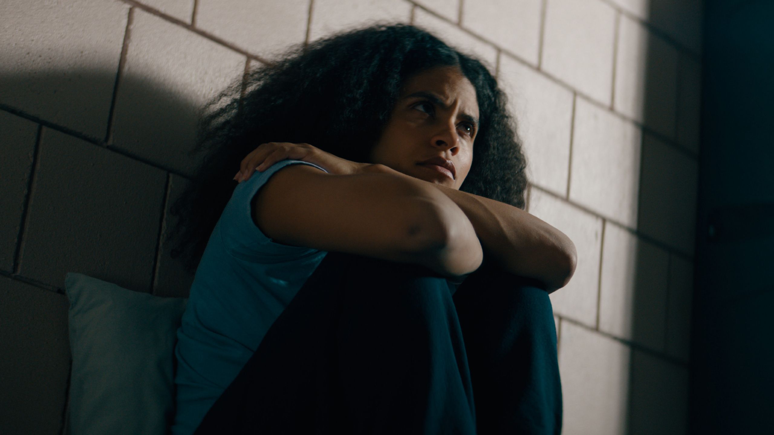 zazie-beetz-puts-her-arms-around-her-knees-while-upset-in-nocturne-on-apple-tv Nocturne: Liev Schreiber Races Against Time In A Chilling & Addictive Serial Killer Thriller | Review