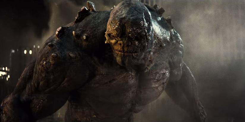 Doomsday from Batman V Superman emerging from rubble.