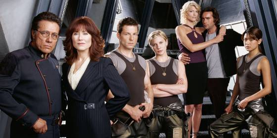 The crew of Battlestar Galactica look on