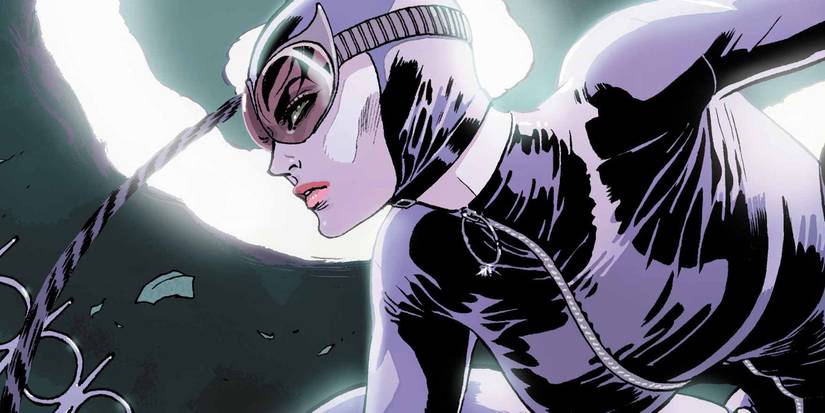  Catwoman leaps to the left wearing her goggles.