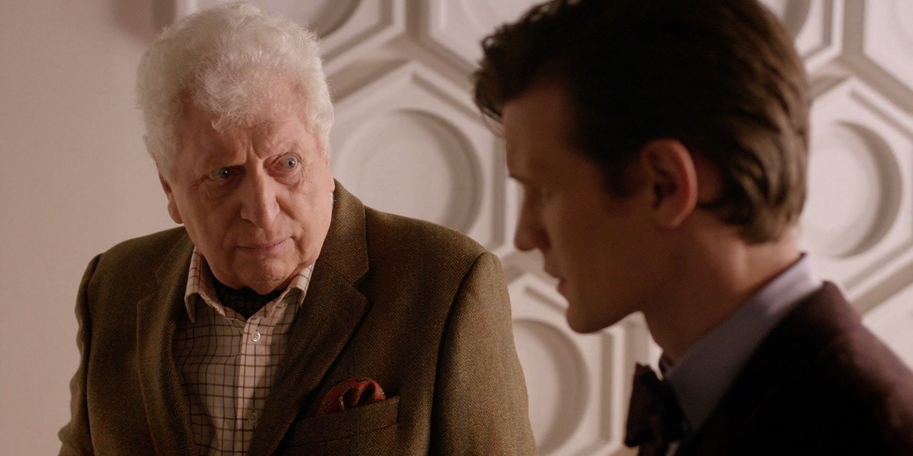 Tom Baker as the Curator in Doctor Who, with Matt Smith as the Eleventh Doctor