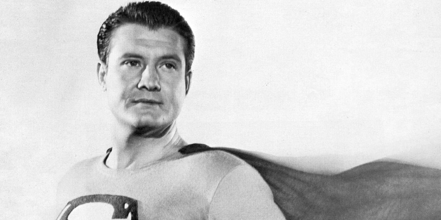 George Reeves as classic TV Superman with cape billowing