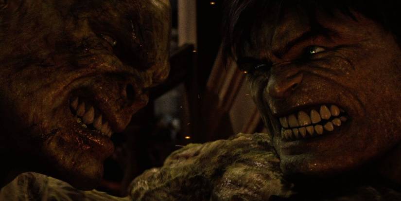 Close-up of Tim Roth's Abomination and Edward Norton's Hulk's faces as they grapple in The Incredible Hulk (2008)