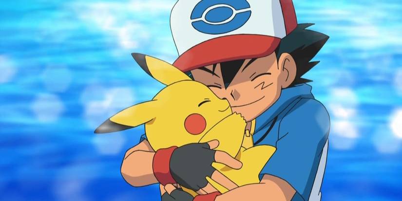 Pikachu and Ash Ketchum hugging.