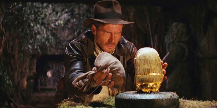 Indiana Jones grabbing an artifact