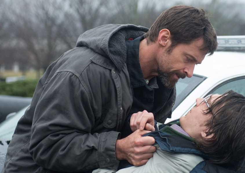 Hugh Jackman as Keller grabbing Paul Dano as Alex in Prisoners