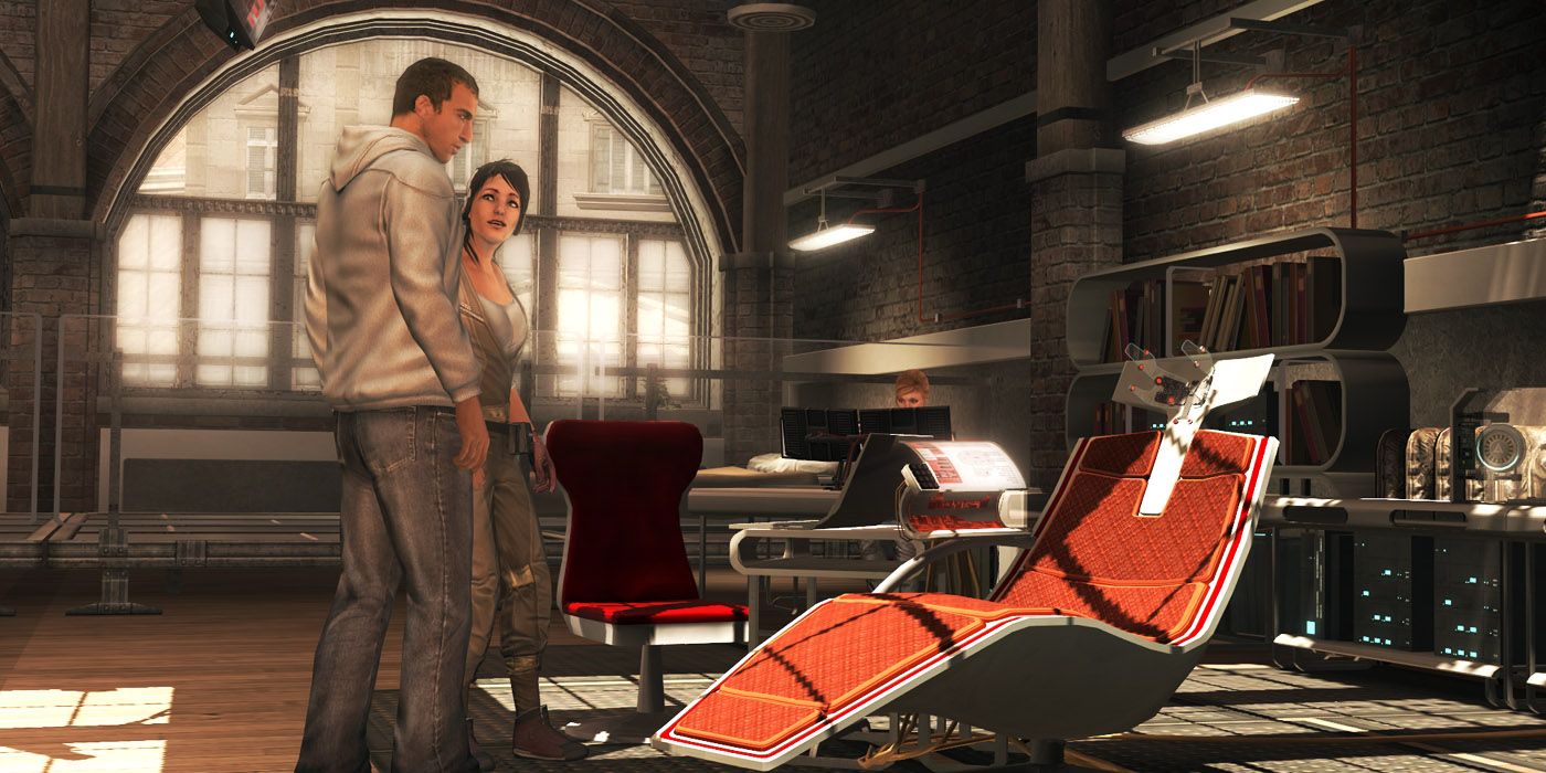 The Animus in Assassin&rsquo;s Creed 2, with Desmond Miles talking to Rebecca Crane in front of the Animus 2.0.