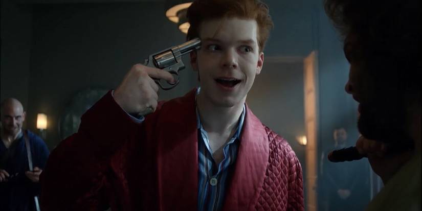 Jerome in Gotham holding a gun to his head