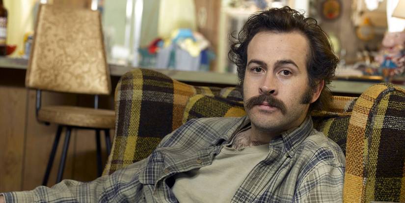 Earl sitting on a chair and looking at the camera in My Name is Earl