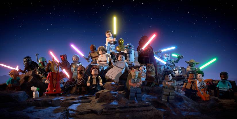 Several LEGO Star Wars characters are assembled for a group shot over a starry backdrop