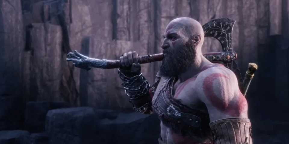 Kratos carrying an axe in God of War Ragnarok.