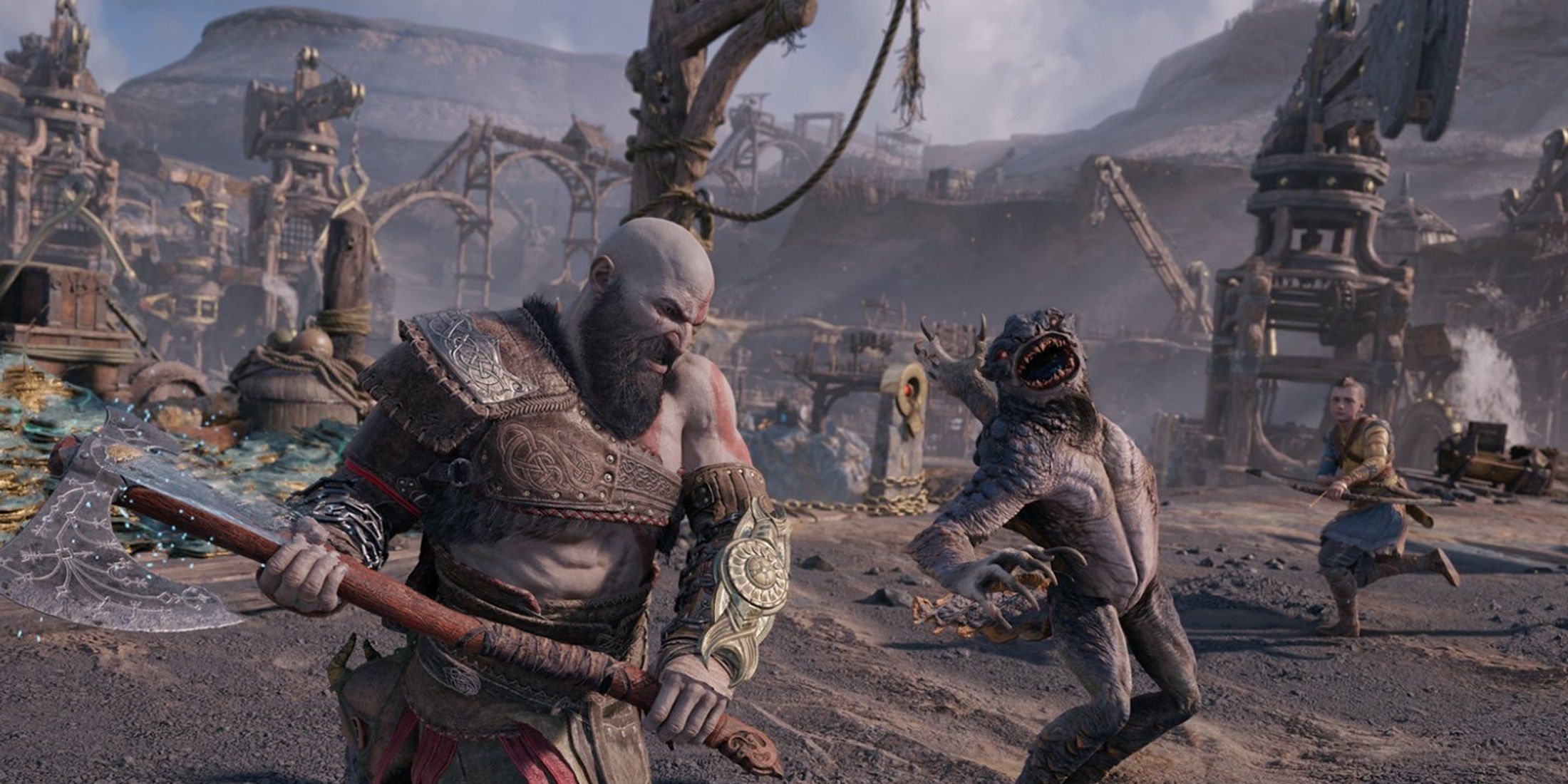 Kratos battling a creature in God of War: Ragnar&ouml;k, with Atreus assisting in the background.
