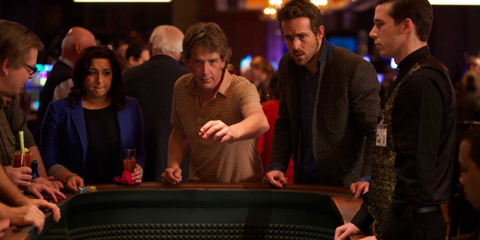 Two men play in a casino in Mississippi Grind