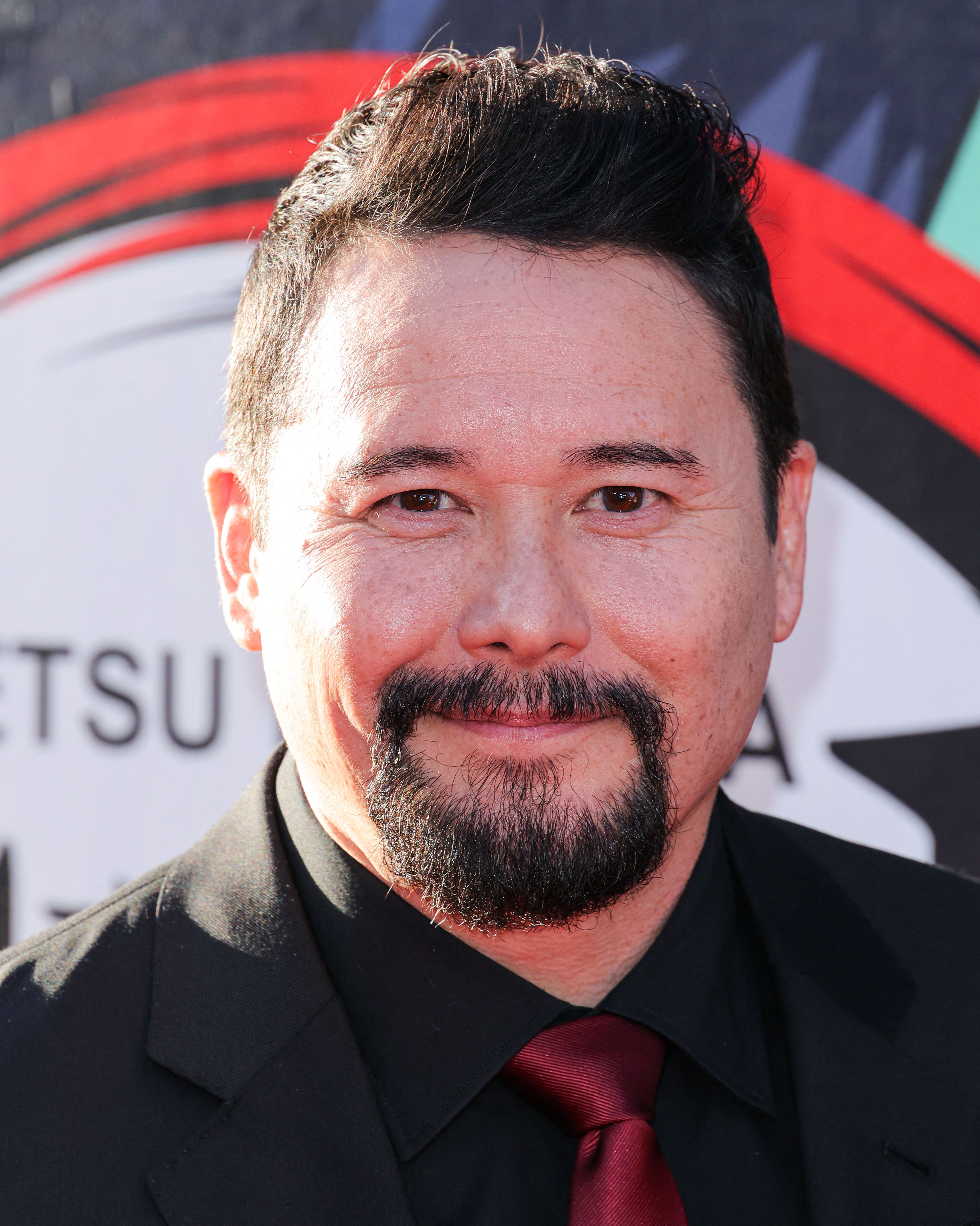 Headshot Of Johnny Yong Bosch