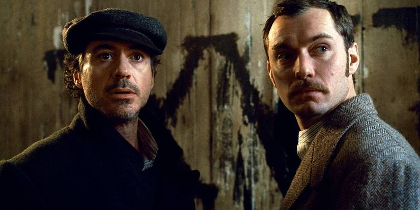 Robert Downey Jr. e Jude Law em cena de Sherlock Holmes