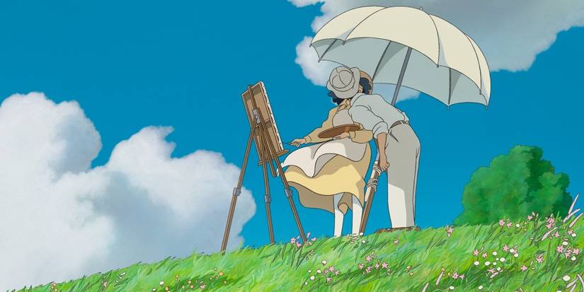 The Wind Rises' Jiro kisses his wife under an umbrella as she paints.